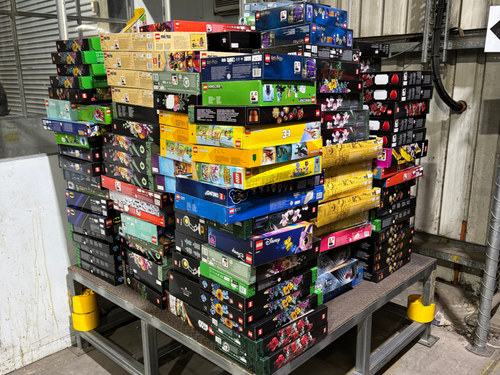 Several boxes of stolen toys, inclduing Lego, seized from an Adelaide house.
