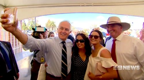 Malcolm Turnbull and his former deputy Barnaby Joyce celebrating the Cup yesterday. 