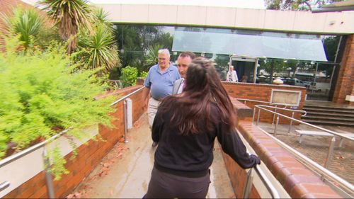 Brett encounters some former partners outside court.