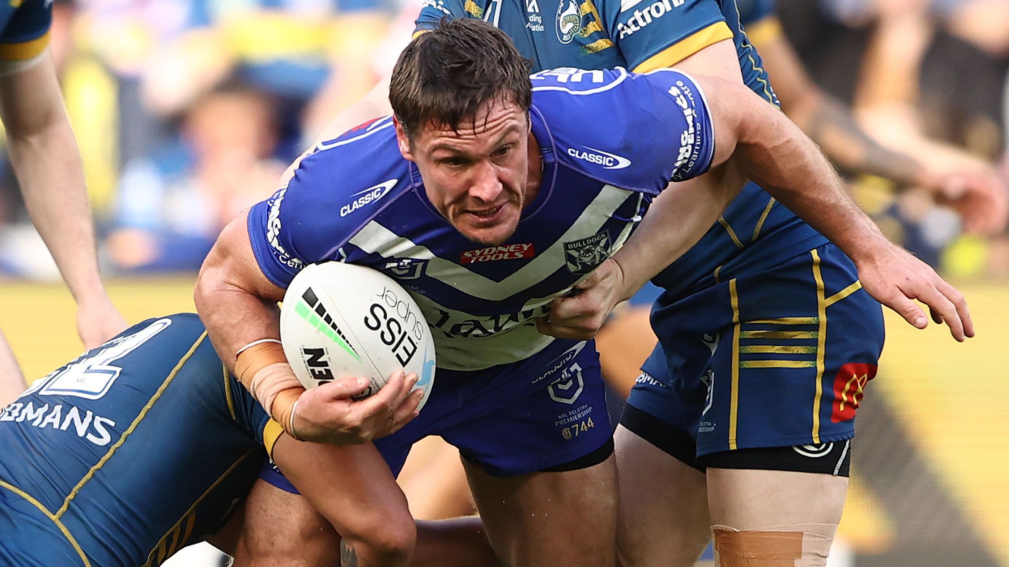 Josh Jackson of the Bulldogs is tackled during their round 23 match against the Eels on August 20, 2022.