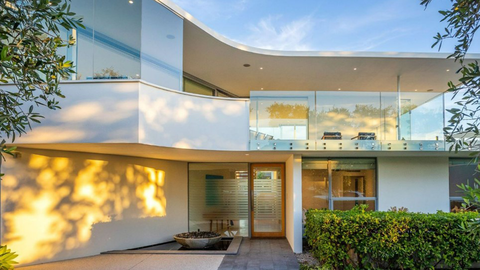 Dramatic see-through pool luxury home under offer City Beach Perth Western Australia four million Domain 