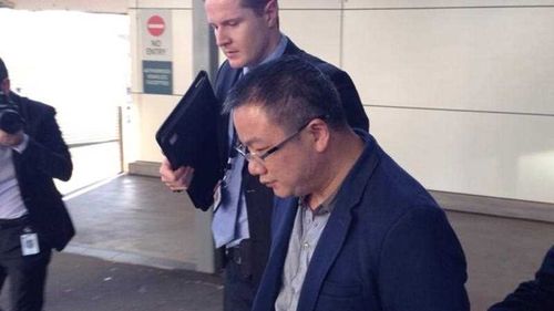 Hanlong chief arrives in Sydney to face largest ever insider trading case