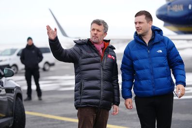 Denmark's King Frederik, left, and Greenland's Prime Minister, Jens-Frederik Nielsen, right, arrive in Nuuk, Greenland, Tuesday, April 29, 2025. (Ida Marie Odgaard/Ritzau Scanpix via AP)