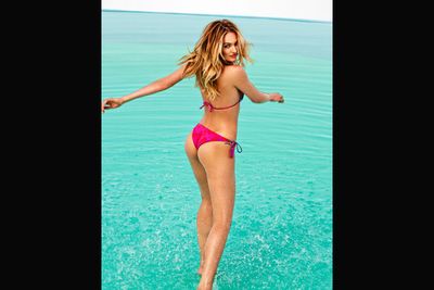 Victoria's Secret is out! And it's South African beauty Candice on a shoot for Agua Bendita's 2014 collection.<br/><br/>Image: