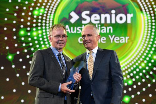 Dr Graham Farquhar AO receiving his award for Senior Australian of the Year. (AAP)