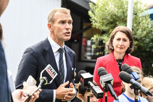 NSW Education Minister Rob Stokes has ordered a review into mobile phone usage in schools and their links to cyber-bullying and online safety. Picture: AAP.