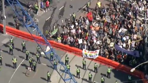Police have created a barricade on the brink of Victorian Parliament. (9NEWS)
