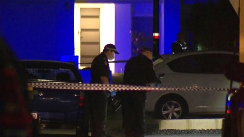 Two streets were locked down and it's understood the woman died outside a neighbour's home in Byford, Perth.