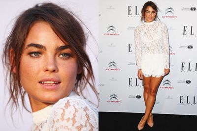 Model Bambi Northwood-Blyth is all eyebrows and tan, smouldering in white lace.<br/><br/>Image: Getty