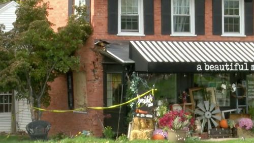 Runaway garbage truck hits store named 'A Beautiful Mess'