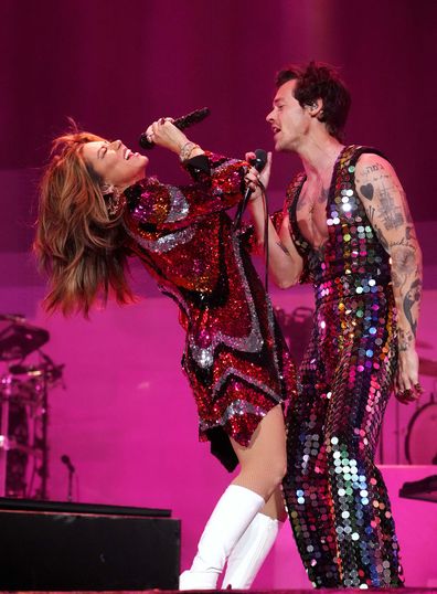 Shania Twain and Harry Styles perform onstage during Coachella