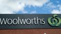 Adelaide, Australia - March 25th, 2012: A large sign  on top of a building for the Woolworths supermarket chain.