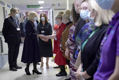 Camilla, the Queen Consort, meets members of staff during a visit to a maternity unit at Chelsea and Westminster hospital in London Thursday, Oct. 13, 2022, to meet key domestic abuse frontline staff.