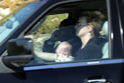 Britney was snapped driving with her infant son Sean Preston sitting unrestrained on her lap, leading to accusations of being a bad mother.  She later explained that she saw a bunch of photographers coming so she just wanted to get away as fast as possible.