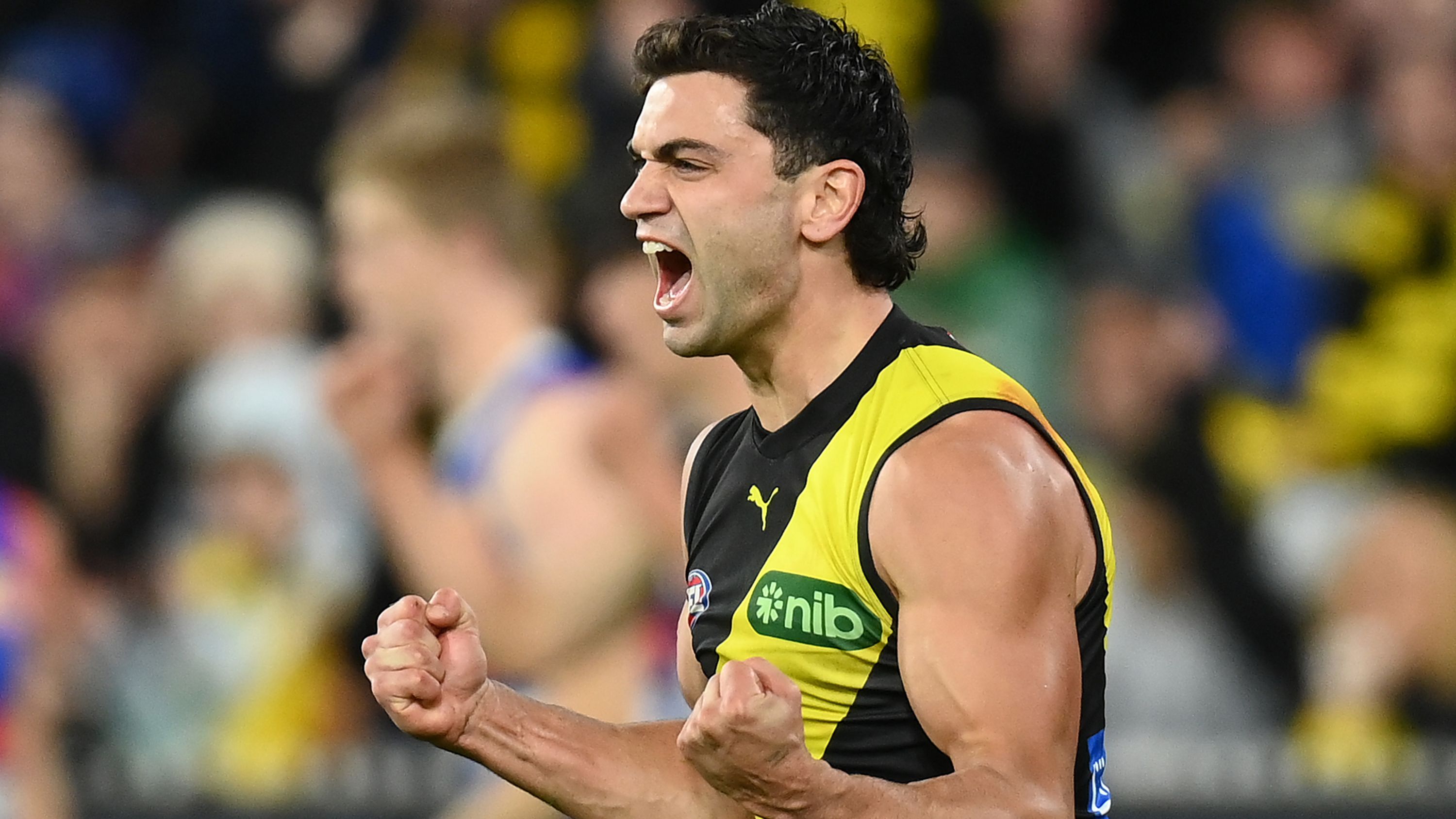 MELBOURNE, AUSTRALIA - APRIL 08: Tim Taranto of the Tigers celebrates kicking a goal during the round four AFL match between Richmond Tigers and Western Bulldogs at Melbourne Cricket Ground, on April 08, 2023, in Melbourne, Australia. (Photo by Quinn Rooney/Getty Images)
