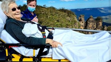 Palliative care patient, Evelyne, at a Three Sisters lookout in Katoomba, NSW.  