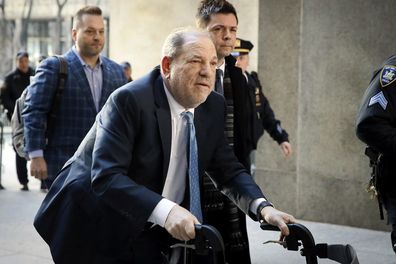 FILE - Harvey Weinstein arrives at a Manhattan courthouse as jury deliberations continue in his rape trial in New York, on Feb. 24, 2020. Opening statements are set to begin Monday in the disgraced movie mogul Harvey Weinstein's Los Angeles rape and sexual assault trial. Weinstein is already serving a 23-year-old sentence for a conviction in New York. (AP Photo/John Minchillo, File)
