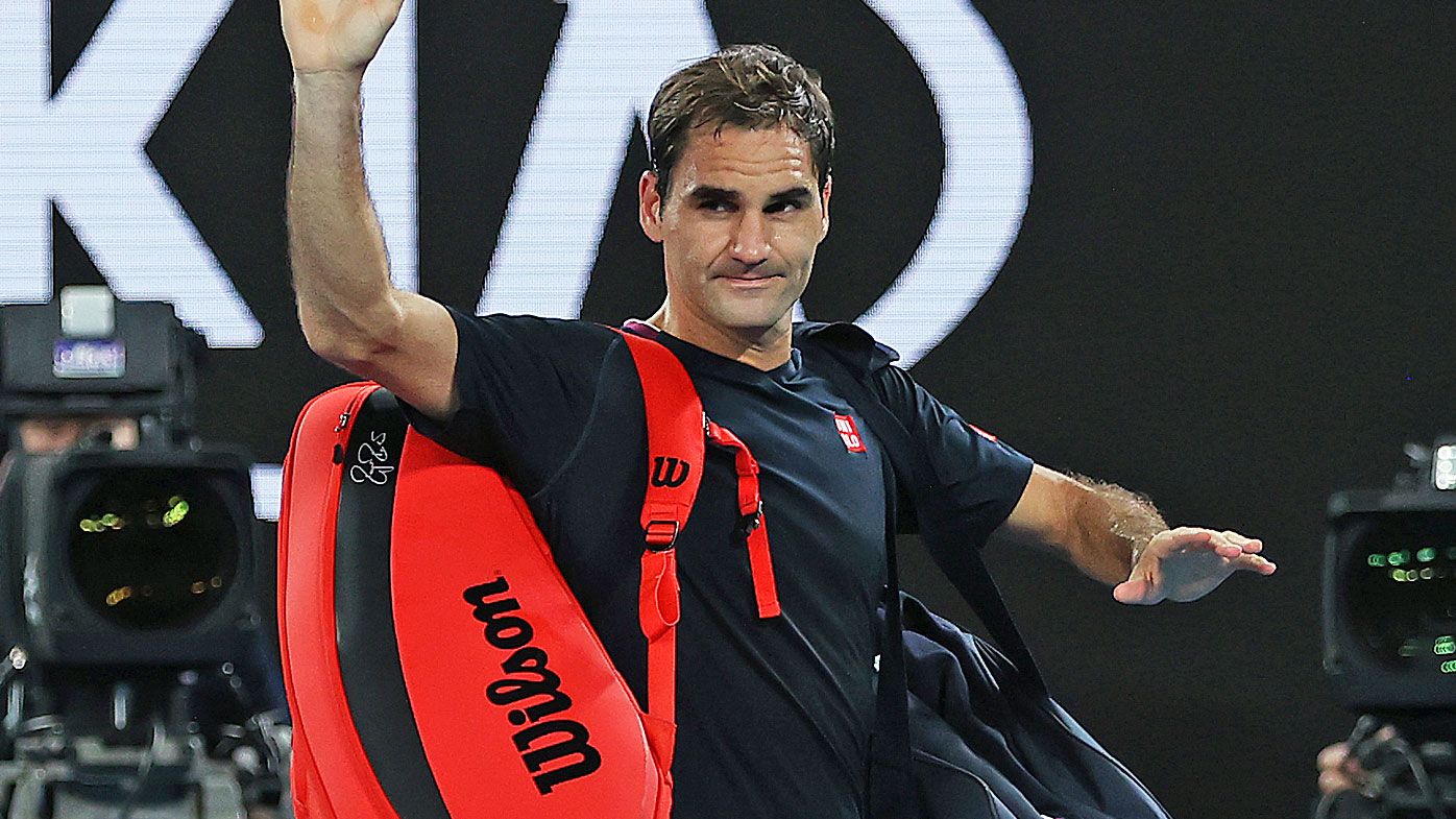 Roger Federer of Switzerland acknowledges the crowd as he walks off court after losing his Men&#x27;s Singles Semifinal match against Novak Djokovic