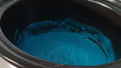 Making blue playdough in a slow cooker.