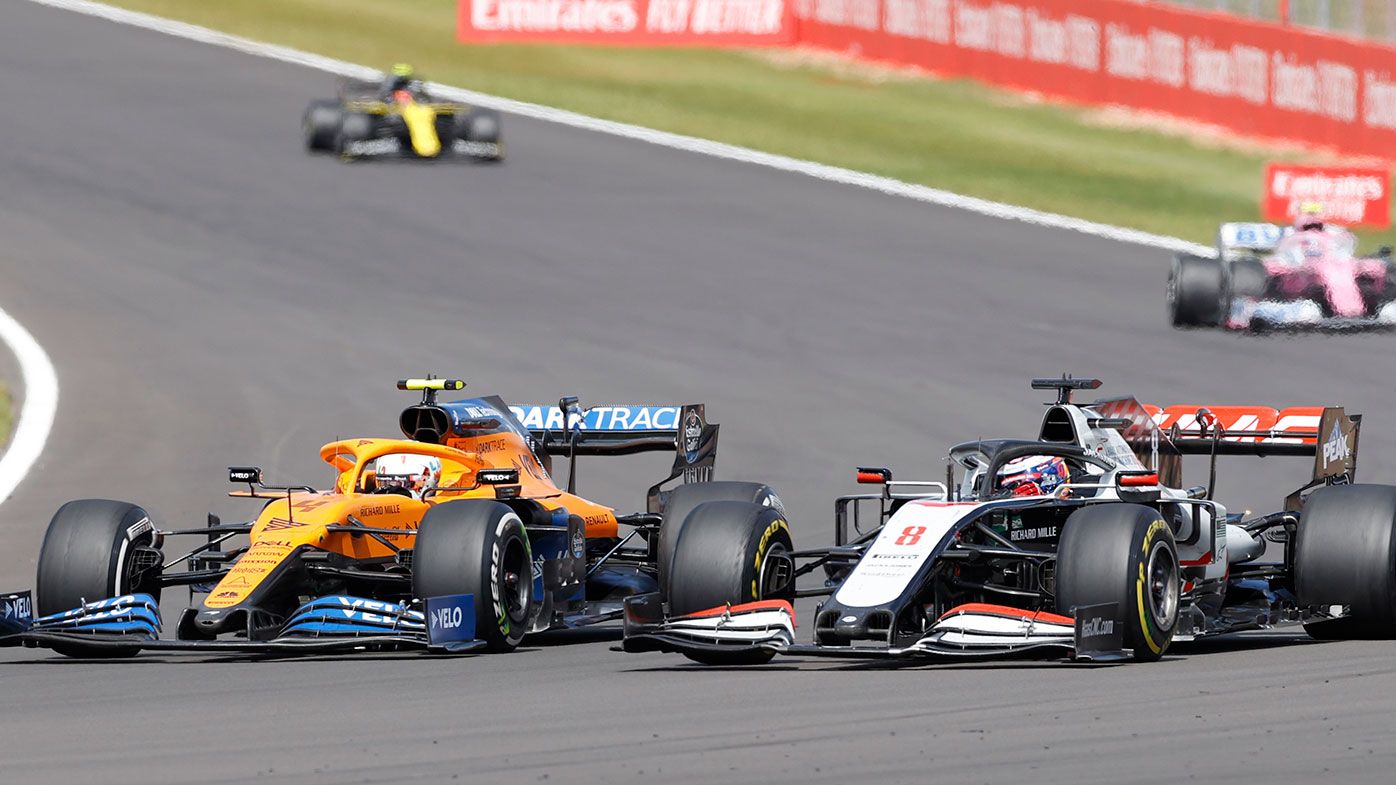 McLaren&#x27;s Lando Norris passes Romain Grosjean during the British Grand Prix.