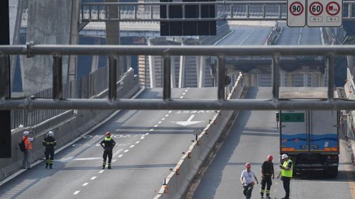 Technicians at work to verify the stability of the Morandi Bridge in Genoa