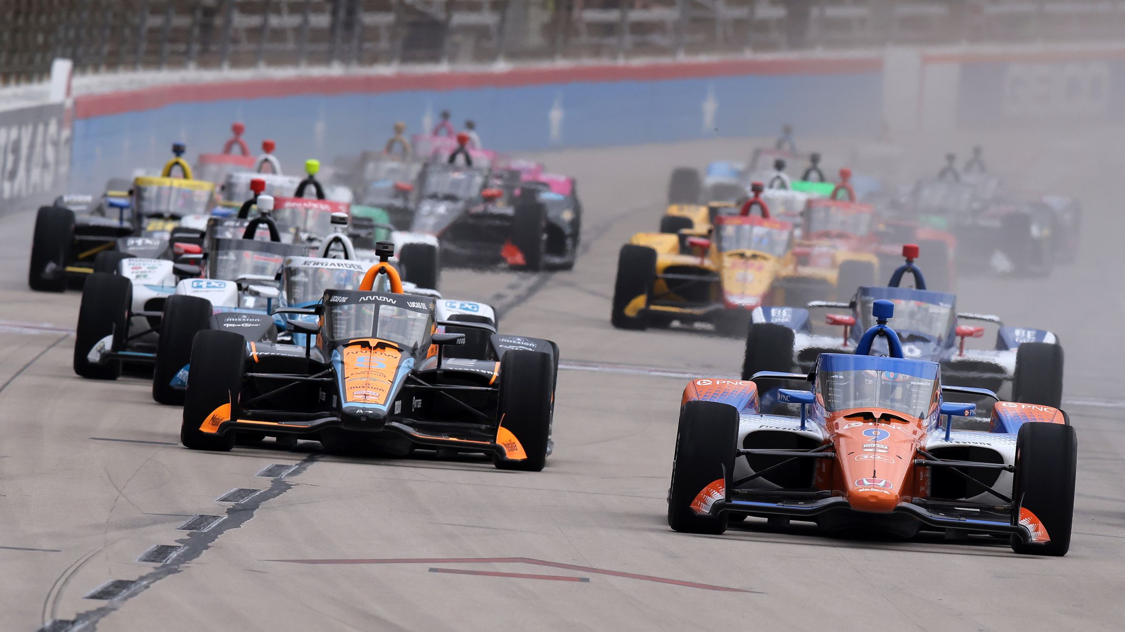 The start of an IndyCar race led by Felix Rosenqvist at Texas Motor Speedway.