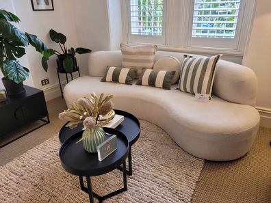 Kmart cushions styled on sofa