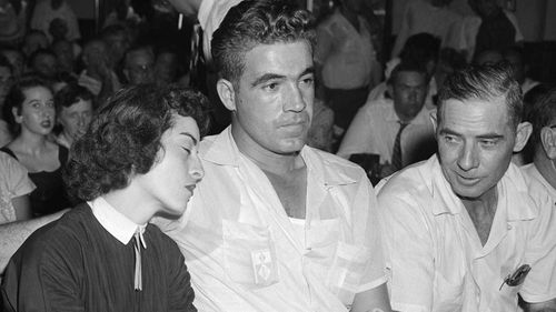 Carolyn Bryant rests her head on her husband Roy Bryant's shoulder after she testified in Emmett Till murder court case.