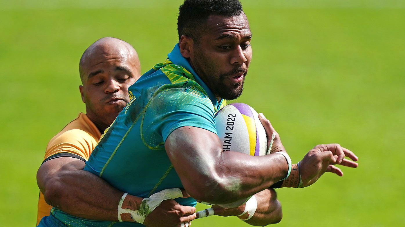 Australia&#x27;s Samu Kerevi (right) is tackled by Jamaica&#x27;s Dy&#x27;Neal Fessal during the Men&#x27;s Pool D Rugby Sevens match at Coventry Stadium on day one of the 2022 Commonwealth Games