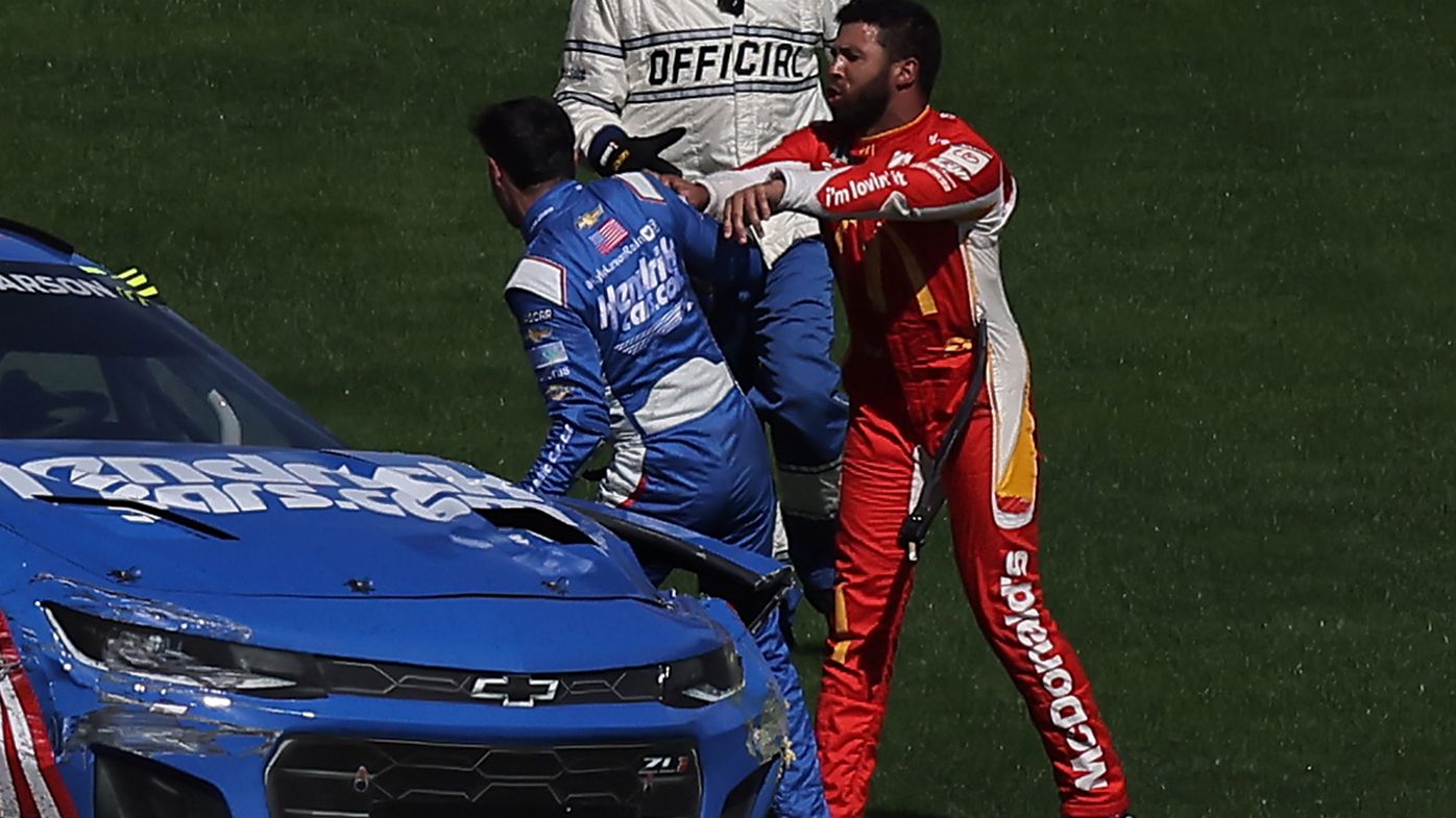 Bubba Wallace pushes Kyle Larson after the pair crashed in Las Vegas.