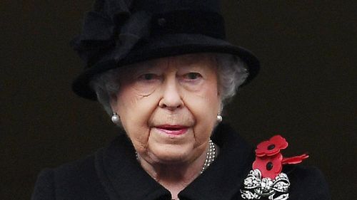 Britain's Queen Elizabeth II watches the Remembrance Sunday service from the Foreign and Commonwealth balcony in London, Britain, November 12, 2017. (AAP)