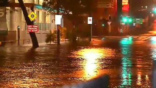 Brisbane has been hit by a powerful rainstorm overnight, with more than 100 millimteres falling in the space of an hour.