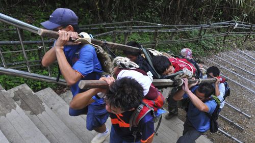 Schoolchildren from Singapore were among those rescued. (AAP)