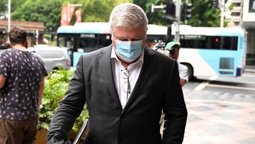 Former Australian test cricketer Stuart MacGill is accused of intimidating a woman, telling her he was going to call the police on her, a court has heard.