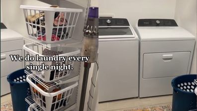 Laundry room with shelves of baskets and a washer and dryer.