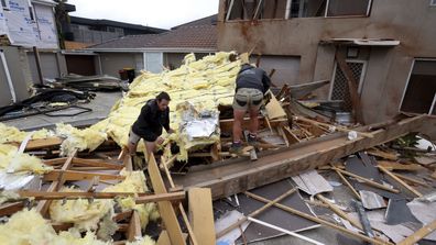 A roof has blown off one apartment building crashing into the next on Beach Road, Mordialloc, Victoria.