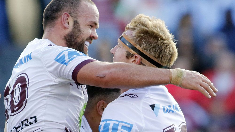 State of Origin rivals Nate Myles and Jake Trbojevic together for Manly. (AAP)