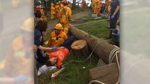 Paramedics and a specialist rope rescue unit began a delicate operation to lift the pole off Mr Barwick before he was loaded onto a stretcher.