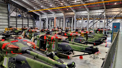 The fleet of Taipan helicopters have been discarded in a Townsville hangar. 