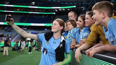 Cortnee Vine of Sydney FC  poses with fans after victory during the round one A-League Women match between Sydney FC and Western Sydney Wanderers at Allianz Stadium on October 14, 2023 in Sydney, Australia. 