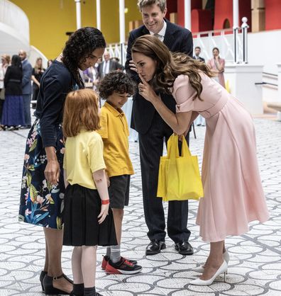 Catherine, Princess of Wales, Patron of the V&A, speaks with children of Globe Primary school in Bethnal Green as she officially opens The Young V&A on June 28, 2023 in London, England.