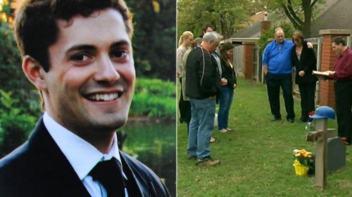 Christopher Lane's family pay tribute to him at a memorial where he was killed. (9NEWS)