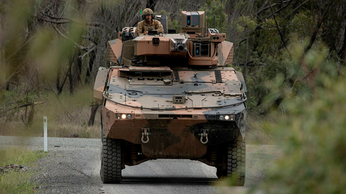 A trooper from the 2nd/14th Light Horse Regiment (Queensland Mounted Infantry) mounted in Boxer Combat Reconnaissance Vehicle at Wide Bay training area, Queensland.