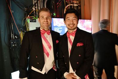 Scott Evans and Simu Liu are seen backstage during the 96th Annual Academy Awards at Dolby Theatre on March 10, 2024 in Hollywood 