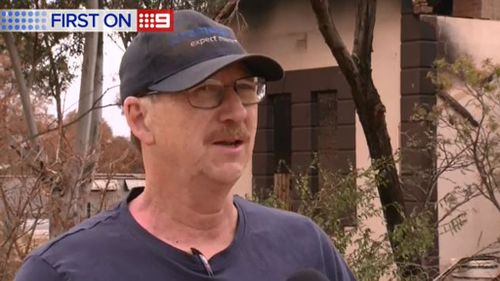 Martin Durnford woke to find a man looting through his burnt out house. (9NEWS)