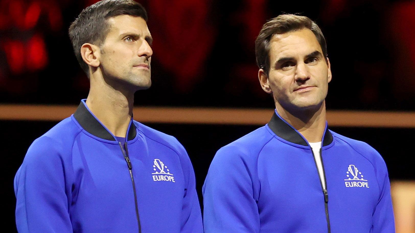 Novak Djokovic and Roger Federer attend the trophy ceremony after the Laver Cup tennis tournament between Team World and Team Europe in London, Britain, on Sept. 26, 2022. 