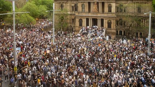 Protestors at Town Hall in Sydney yesterday.