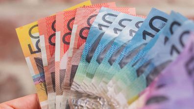 handful of australian money cash