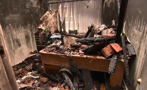 Man charged over office destroyed by fire