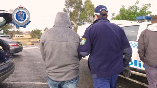 Search warrants were also executed on homes at Prestons and Abbotsbury.